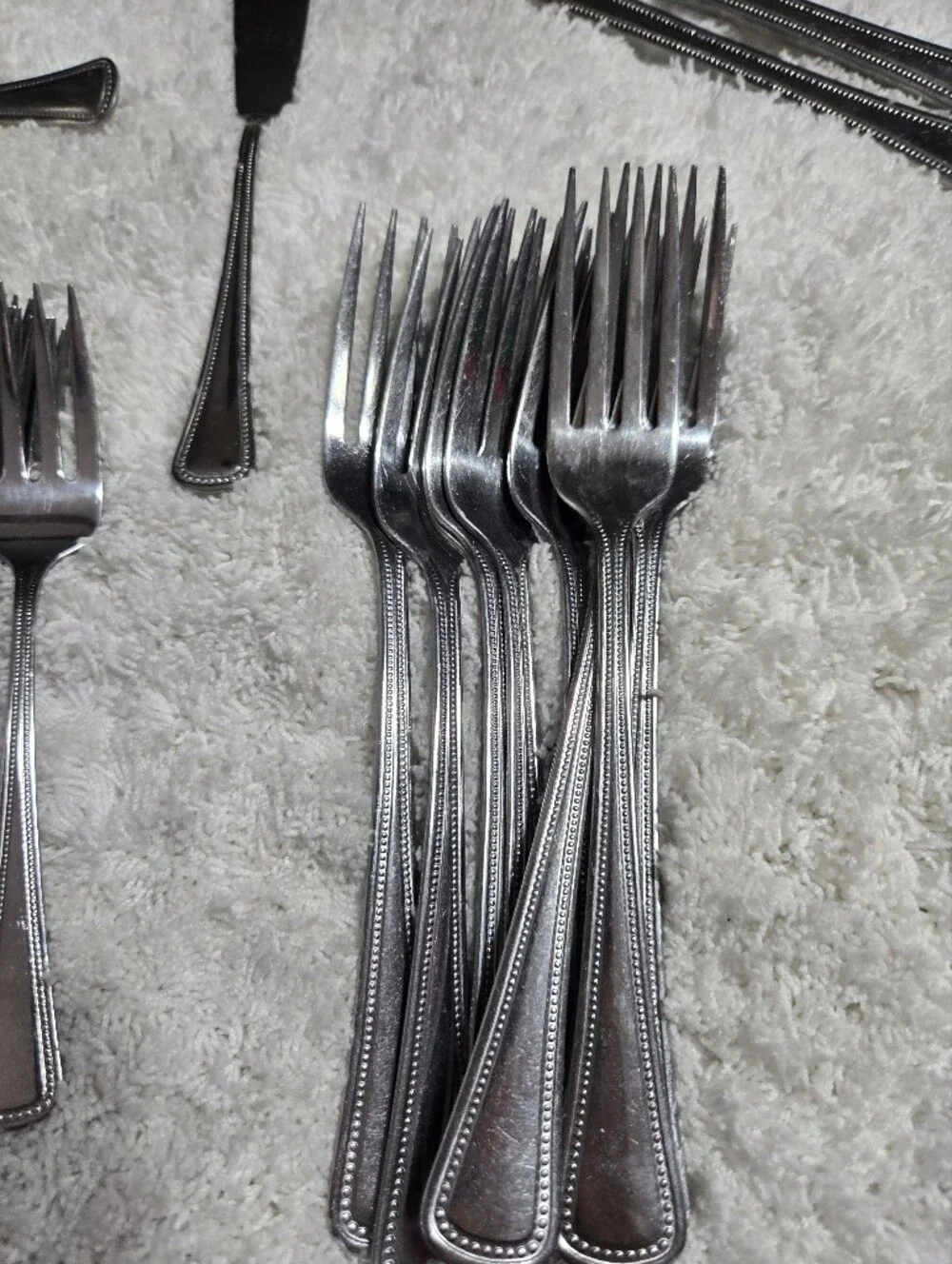 Oneida needlepoint flatware several Items used flatware